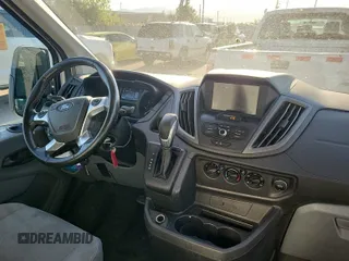 2019 Ford Transit z VIN 1FTYR2CG7KKA96911, wystawiony jako IAAI lot #42566551 z przebiegiem 207 807 mil mil oraz . Historia ofert i sprzedaży dostępna na DreamBid. Obrazek 34.
