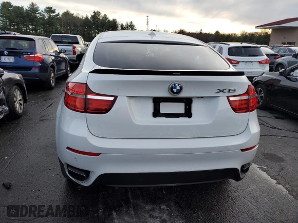 2013 BMW X6 xDrive50i z VIN 5UXFG8C52DL591043, wystawiony jako Copart lot #85150504 z przebiegiem 106 179 mil mil oraz Szkoda całkowita • Salvage title. Historia ofert i sprzedaży dostępna na DreamBid. Obrazek 6.