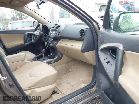 2011 Toyota RAV4 with VIN 2T3BK4DV1BW048945, listed as a IAAI auction lot 42047540 with 215,032 mi miles. Bid and sale history available at carsss.com. Image 5.