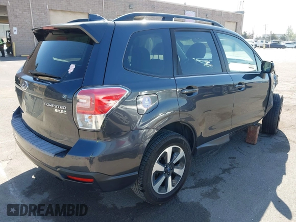 2017 Subaru Forester Premium with VIN JF2SJAGC8HH590684, listed as a IAAI auction lot 42136061 with 59,797 mi miles and . Bid and sale history available at DreamBid. Image 4.