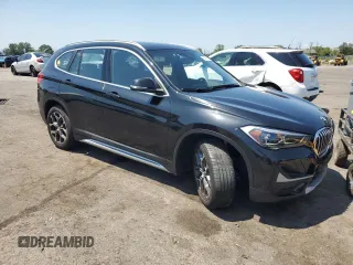 2021 BMW X1 xDrive28i with VIN WBXJG9C06M5S33201, listed as a Copart auction lot 66391015 with 53,395 mi miles and Salvage title. Bid and sale history available at DreamBid. Image 4.