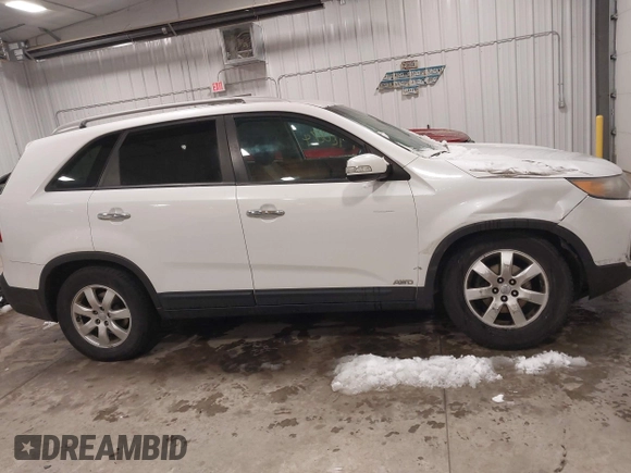 2012 Kia Sorento LX with VIN 5XYKTDA28CG217978, listed as a IAAI auction lot 41920274 with 151,978 mi miles. Bid and sale history available at carsss.com. Image 13.