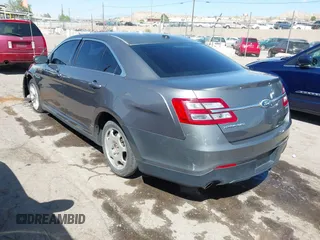 2013 Ford Taurus SEL with VIN 1FAHP2E81DG113242, listed as a IAAI auction lot 41952486 with 169,369 mi miles. Bid and sale history available at carsss.com. Image 3.