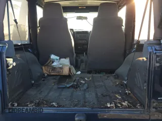 2005 Jeep Wrangler SE with VIN 1J4FA29S95P370542, listed as a Copart auction lot 85571924 with 105,465 mi miles and Salvage Title. Bid and sale history available at carsss.com. Image 10.