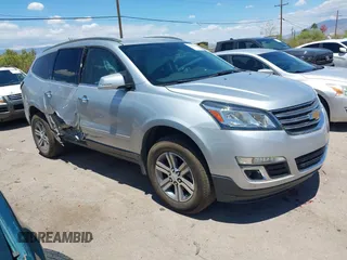 2015 Chevrolet Traverse LT z VIN 1GNKRHKD4FJ135456, wystawiony jako IAAI lot #42394335 z przebiegiem 185 734 mil mil oraz . Historia ofert i sprzedaży dostępna na DreamBid. Obrazek 1.