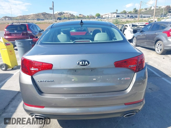 2013 Kia Optima EX z VIN 5XXGN4A70DG252497, wystawiony jako IAAI lot #42145025 z przebiegiem 90 867 mil mil oraz . Historia ofert i sprzedaży dostępna na DreamBid. Obrazek 17.