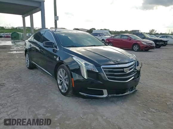 2018 Cadillac XTS Livery z VIN 2G61U5S35J9145963, wystawiony jako Copart lot #86895164 z przebiegiem 45 697 mil mil oraz Szkoda całkowita • Salvage title. Historia ofert i sprzedaży dostępna na DreamBid. Obrazek 13.