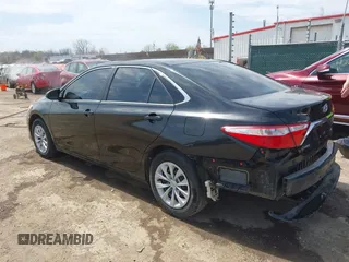 2016 Toyota Camry XLE with VIN 4T4BF1FK0GR581297, listed as a IAAI auction lot 42059507 with 151,777 mi miles. Bid and sale history available at carsss.com. Image 3.