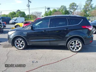 2013 Ford Escape Titanium с VIN 1FMCU9J90DUC40758, выставлен на аукционе IAAI как лот 41927827 с пробегом 110 614 миль миль и . История ставок и продаж доступна на DreamBid. Изображение 14.
