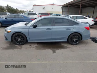 2022 Honda Civic Sport z VIN 2HGFE2F58NH569211, wystawiony jako IAAI lot #41784870 z przebiegiem 22 255 mil mil oraz . Historia ofert i sprzedaży dostępna na DreamBid. Obrazek 14.