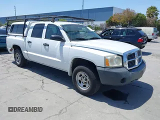 2006 Dodge Dakota ST z VIN 1D7HE28KX6S525186, wystawiony jako IAAI lot #42477306 z przebiegiem 195 817 mil mil oraz . Historia ofert i sprzedaży dostępna na DreamBid. Obrazek 1.