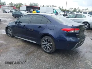 2021 Toyota Corolla SE with VIN JTDS4MCE6MJ054785, listed as a IAAI auction lot 41881709 with 62,833 mi miles. Bid and sale history available at carsss.com. Image 3.