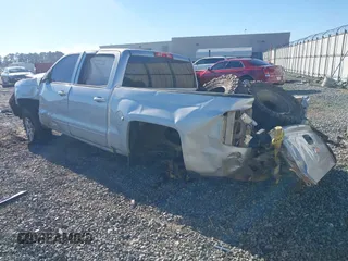 2016 Chevrolet Silverado 1500 LT with VIN 3GCUKREC0GG131034, listed as a IAAI auction lot 41289762 with 176,978 mi miles and . Bid and sale history available at DreamBid. Image 3.