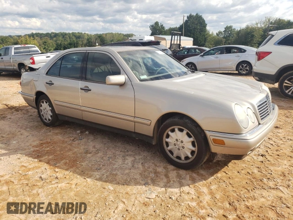 1999 Mercedes-Benz E-Class with VIN WDBJF65HXXA891437, listed as a Copart auction lot 73278334 with 197,159 mi miles and Salvage Title. Bid and sale history available at carsss.com. Image 4.