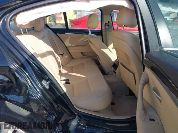 2015 BMW 5 Series 528i with VIN WBA5A5C56FD519138, listed as a IAAI auction lot 41989497 with 214,326 mi miles and . Bid and sale history available at DreamBid. Image 8.