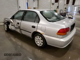 1998 Honda Civic LX z VIN 1HGEJ6670WL034166, wystawiony jako Copart lot #50903275 z przebiegiem 115 592 mil mil oraz Szkoda całkowita • Salvage title. Historia ofert i sprzedaży dostępna na DreamBid. Obrazek 2.
