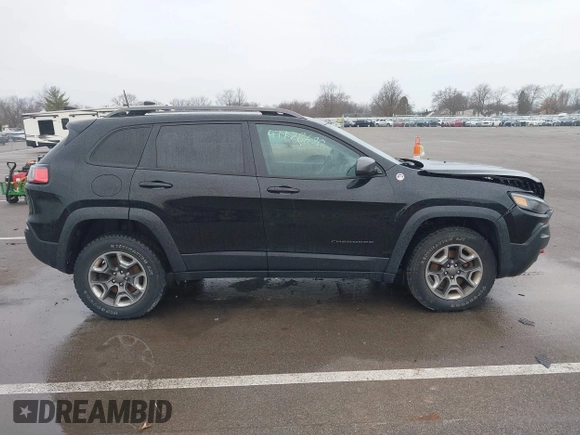 2019 Jeep Cherokee Trailhawk Elite with VIN 1C4PJMBX6KD418409, listed as a IAAI auction lot 41178690 with 80,755 mi miles. Bid and sale history available at carsss.com. Image 13.