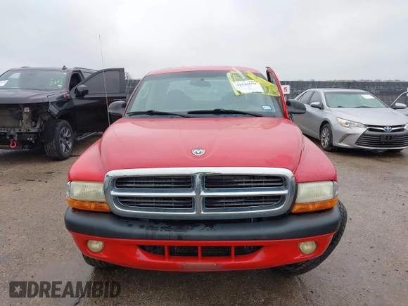 2004 Dodge Dakota Sport with VIN 1D7HL38KX4S657177, listed as a IAAI auction lot 41534575 with 38,802 mi miles. Bid and sale history available at carsss.com. Image 12.
