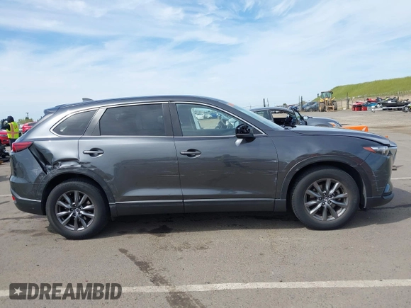 2021 Mazda CX-9 Sport with VIN JM3TCBBY7M0520437, listed as a IAAI auction lot 42022562 with 77,063 mi miles and . Bid and sale history available at DreamBid. Image 13.