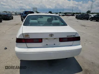 1998 Toyota Camry LE z VIN JT2BG22K9W0145537, wystawiony jako Copart lot #59018505 z przebiegiem 301 595 mil mil oraz Czysty tytuł • Clean title. Historia ofert i sprzedaży dostępna na DreamBid. Obrazek 6.