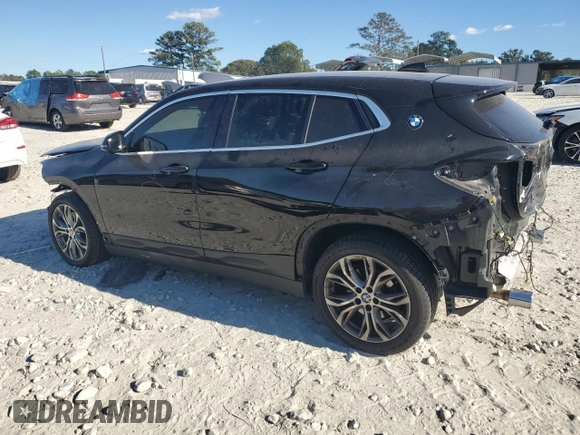 2021 BMW X2 sDrive28i with VIN WBXYH9C08M5S47984, listed as a Copart auction lot 74954164 with 70,829 mi miles and Salvage Title. Bid and sale history available at carsss.com. Image 2.