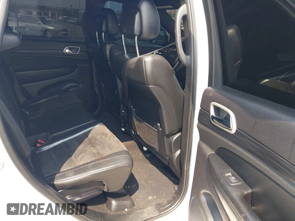 2020 Jeep Grand Cherokee Laredo E with VIN 1C4RJFAG5LC375033, listed as a IAAI auction lot 42415231 with 62,489 mi miles and . Bid and sale history available at DreamBid. Image 8.