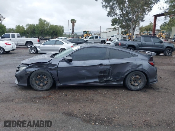 2020 Honda Civic Si with VIN 2HGFC3A57LH753345, listed as a IAAI auction lot 42074785 with 89,069 mi miles and . Bid and sale history available at DreamBid. Image 14.
