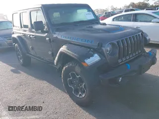2023 Jeep Wrangler Rubicon with VIN 1C4JJXR67PW662277, listed as a IAAI auction lot 41950065 with 35,714 mi miles and . Bid and sale history available at DreamBid. Image 1.