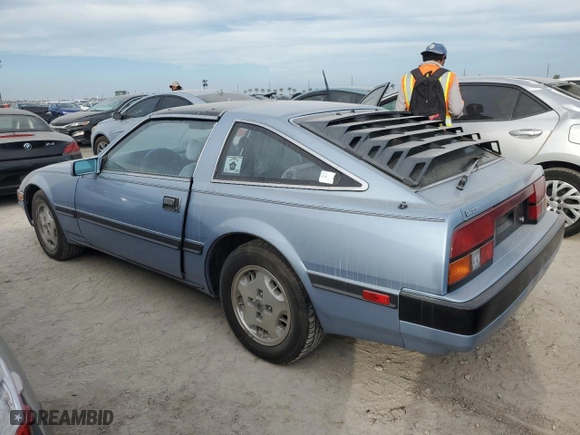 1985 Nissan 300ZX with VIN JN1HZ16S2FX056662, listed as a Copart auction lot 76184674 with NaN miles and Salvage Title. Bid and sale history available at carsss.com. Image 2.