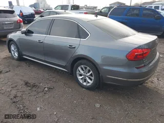 2016 Volkswagen Passat 1.8T S with VIN 1VWAS7A37GC026679, listed as a IAAI auction lot 41229736 with 193,792 mi miles. Bid and sale history available at carsss.com. Image 3.
