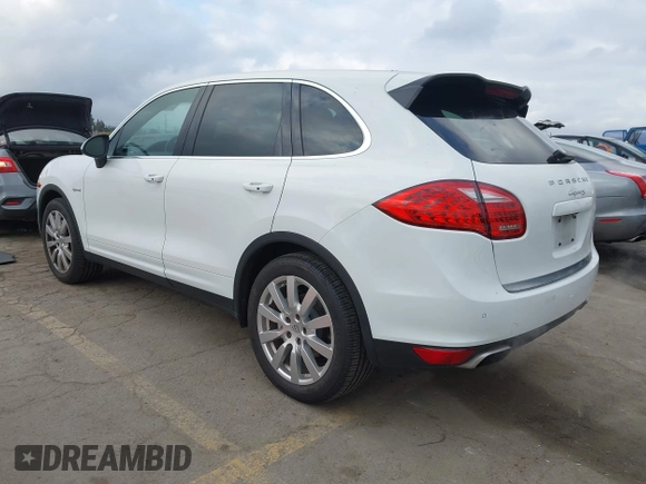 2014 Porsche Cayenne S Hybrid with VIN WP1AE2A28ELA51123, listed as a IAAI auction lot 42091475 with 41,341 mi miles and . Bid and sale history available at DreamBid. Image 3.