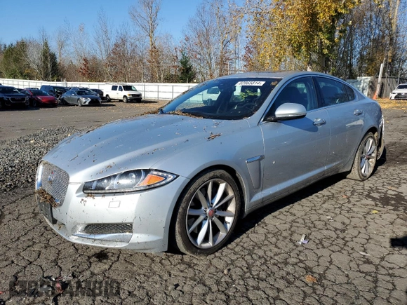 2015 Jaguar XF V6 Portfolio with VIN SAJWA0F7XF8U51105, listed as a Copart auction lot 82865814 with 62,807 mi miles and Salvage Title. Bid and sale history available at carsss.com. Image 1.
