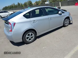 2015 Toyota Prius Four with VIN JTDKN3DU0F0443458, listed as a IAAI auction lot 42086506 with 121,952 mi miles and . Bid and sale history available at DreamBid. Image 4.