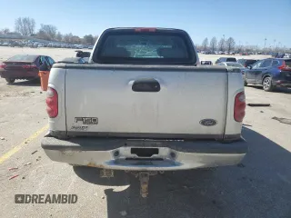 2003 Ford F-150 XLT with VIN 1FTRW08L03KD74119, listed as a Copart auction lot 47373105 with 303,513 mi miles and Salvage Title. Bid and sale history available at carsss.com. Image 6.