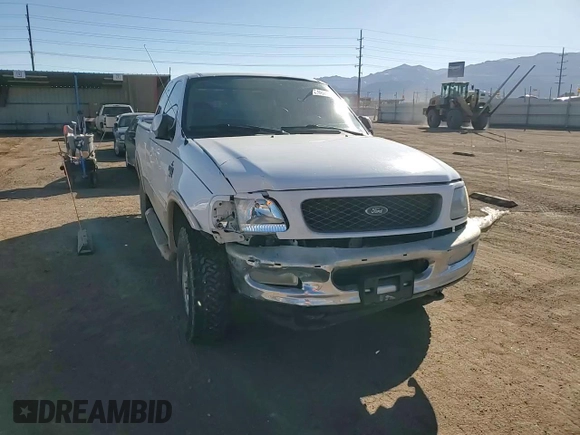 1998 Ford F-150 with VIN 1FTZX18W3WNA25682, listed as a Copart auction lot 47494755 with 197,389 mi miles and Salvage title. Bid and sale history available at DreamBid. Image 11.
