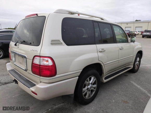 2004 Lexus LX 470 with VIN JTJHT00W243543558, listed as a Copart auction lot 74859974 with 189,556 mi miles and Salvage Title. Bid and sale history available at carsss.com. Image 3.