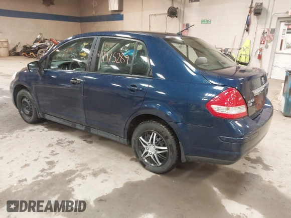 2009 Nissan Versa 1.8 S with VIN 3N1BC11E79L440560, listed as a IAAI auction lot 41975289 with 158,726 mi miles. Bid and sale history available at carsss.com. Image 3.