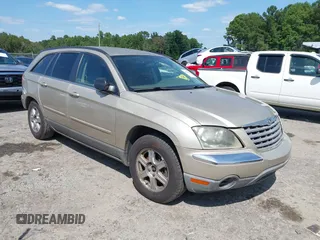 2005 Chrysler Pacifica Touring with VIN 2C4GM68435R386939, listed as a IAAI auction lot 40044825 with 302,984 mi miles and . Bid and sale history available at DreamBid. Image 1.