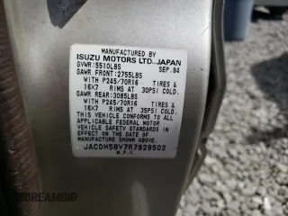 1994 Isuzu Trooper z VIN JACDH58V7R7929502, wystawiony jako Copart lot #70280554 z przebiegiem 243 827 mil mil oraz Tytuł czysty. Historia ofert i sprzedaży dostępna na DreamBid. Obrazek 13.