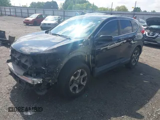 2018 Honda CR-V EX with VIN 7FARW1H59JE001943, listed as a IAAI auction lot 42123180 with 72,451 mi miles and . Bid and sale history available at carsss.com. Image 20.
