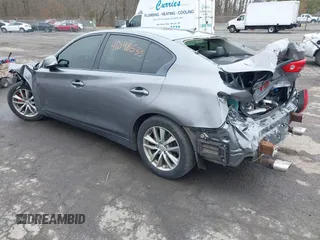 2014 Infiniti Q50 Premium with VIN JN1BV7AR8EM682452, listed as a IAAI auction lot 41848533 with 103,646 mi miles. Bid and sale history available at carsss.com. Image 3.