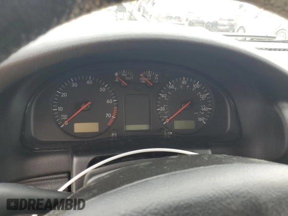 1999 Volkswagen Passat GL z VIN WVWMD63B1XE216281, wystawiony jako Copart lot #75200694 z przebiegiem Nie podano mil oraz Nie do naprawy • Non repairable. Historia ofert i sprzedaży dostępna na DreamBid. Obrazek 9.