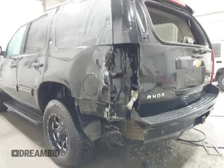2013 Chevrolet Tahoe LT with VIN 1GNSKBE07DR305706, listed as a IAAI auction lot 42004594 with 166,020 mi miles and . Bid and sale history available at DreamBid. Image 6.