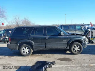 2001 Oldsmobile Bravada with VIN 1GHDT13W312117182, listed as a IAAI auction lot 41457726 with 160,288 mi miles. Bid and sale history available at carsss.com. Image 13.