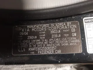 2005 Kia Spectra with VIN KNAFE161255083357, listed as a IAAI auction lot 41445285 with 90,349 mi miles. Bid and sale history available at carsss.com. Image 9.
