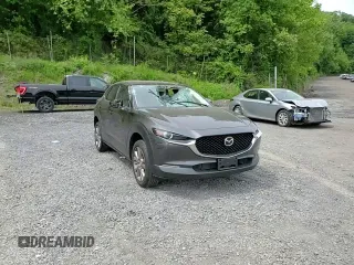 2021 Mazda CX-30 Preferred z VIN 3MVDMBCL1MM256818, wystawiony jako Copart lot #57885285 z przebiegiem 29 533 mil mil oraz Szkoda całkowita • Salvage title. Historia ofert i sprzedaży dostępna na DreamBid. Obrazek 13.