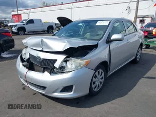 2009 Toyota Corolla with VIN JTDBL40E59J051651, listed as a IAAI auction lot 41874710 with 52,938 mi miles. Bid and sale history available at carsss.com. Image 17.