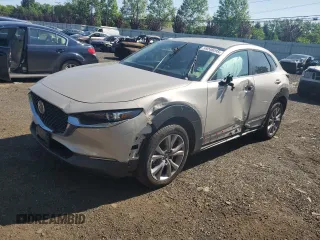 2023 Mazda CX-30 S Select with VIN 3MVDMBBM2PM516481, listed as a Copart auction lot 59246295 with 73,442 mi miles and Salvage title. Bid and sale history available at DreamBid. Image 1.