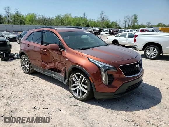 2019 Cadillac XT4 AWD Sport with VIN 1GYFZFR42KF136567, listed as a Copart auction lot 52018445 with 99,944 mi miles and Salvage title. Bid and sale history available at DreamBid. Image 12.
