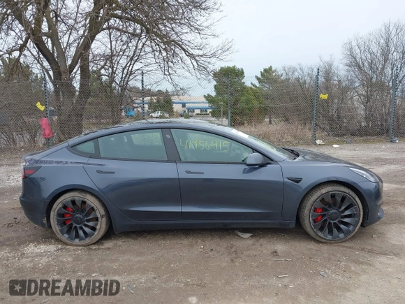 2023 Tesla Model 3 Performance with VIN 5YJ3E1EC9PF407365, listed as a IAAI auction lot 41956915 with 31,087 mi miles. Bid and sale history available at carsss.com. Image 13.
